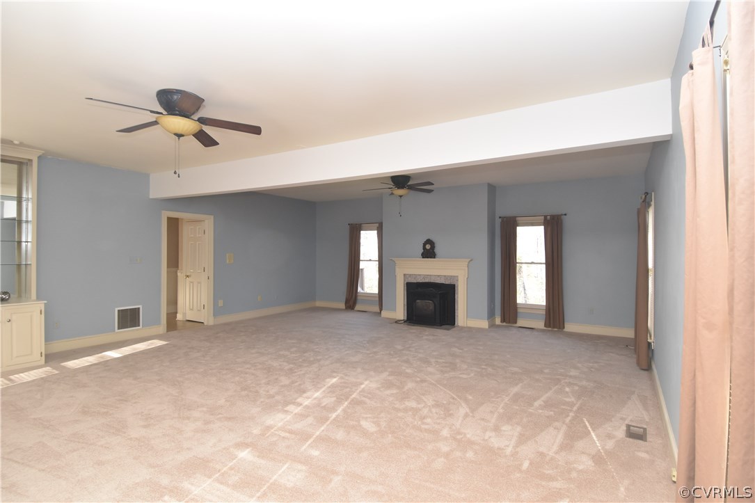 13806 Beechwood Point Road Midlothian, VA 23112 - Photo 24 of 48 a view of an empty room with a fireplace and a window