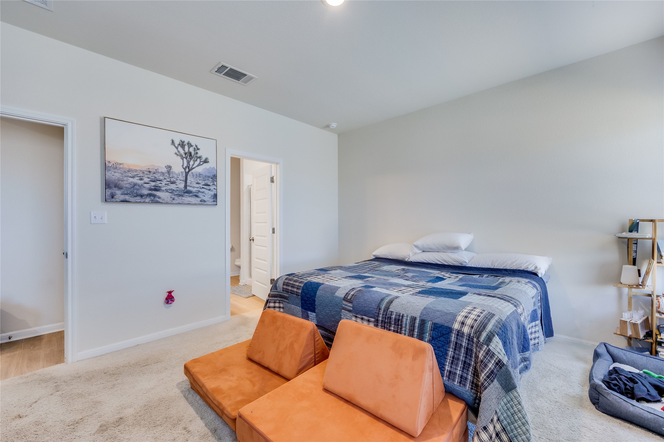 263 Tolo Drive Elgin, TX 78621 - Photo 9 of 12 Bedroom with light colored carpet and baseboards