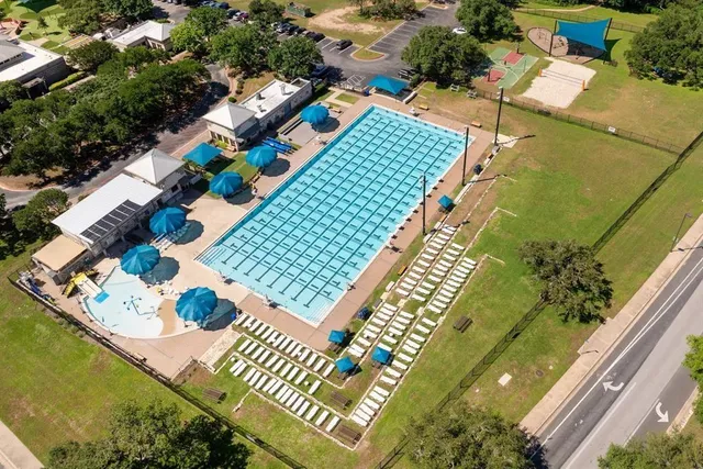 a view of a lake with a yard