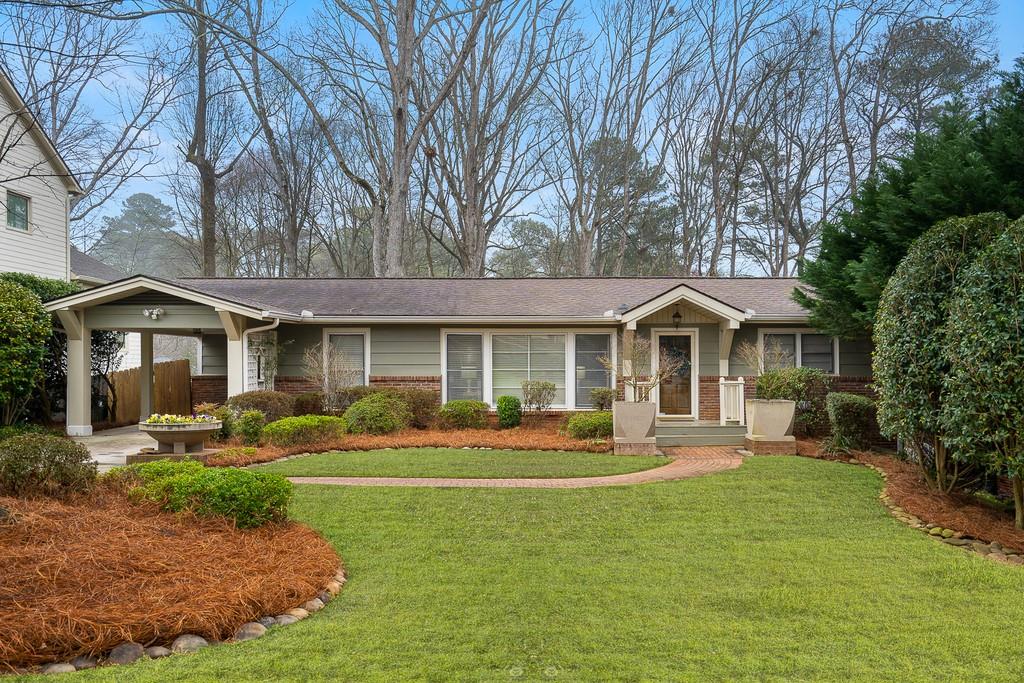 3619 London Road Chamblee, GA 30341 - Photo 1 of 1 a front view of a residential houses with yard and green space
