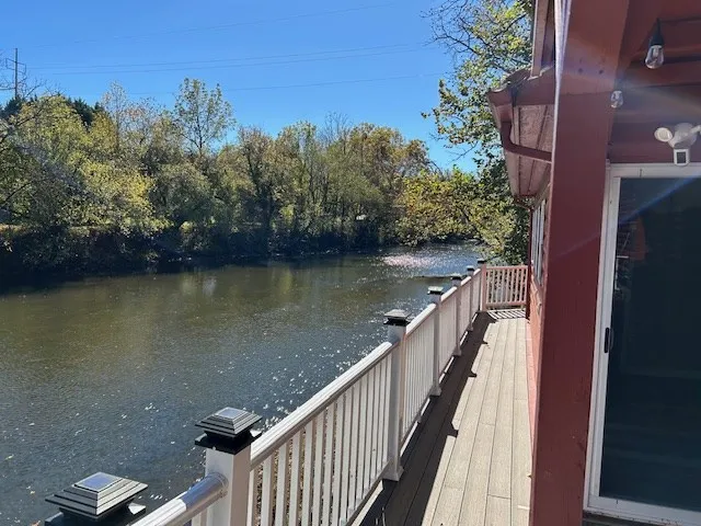 a view of a lake from a balcony