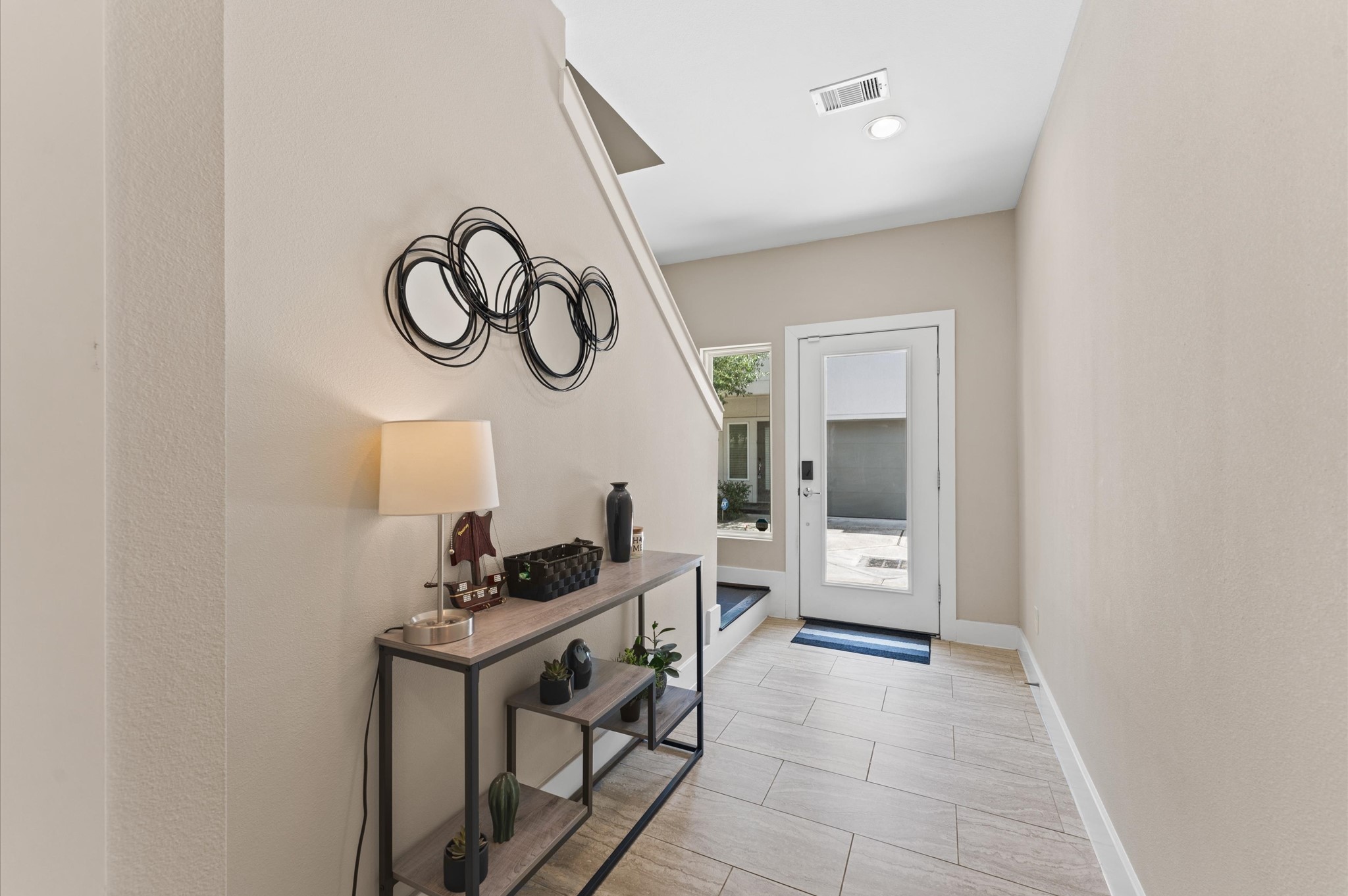 2422 Cochran Street Houston, TX 77009 - Photo 8 of 31 As far as entryways go, this is bright and welcoming.