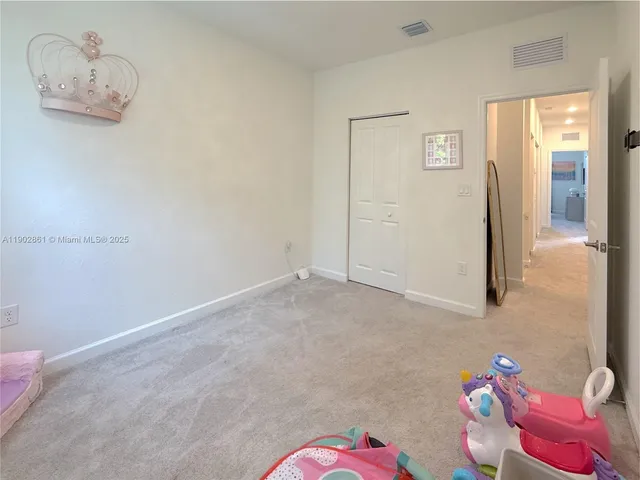 a bath tub sitting next to a shower