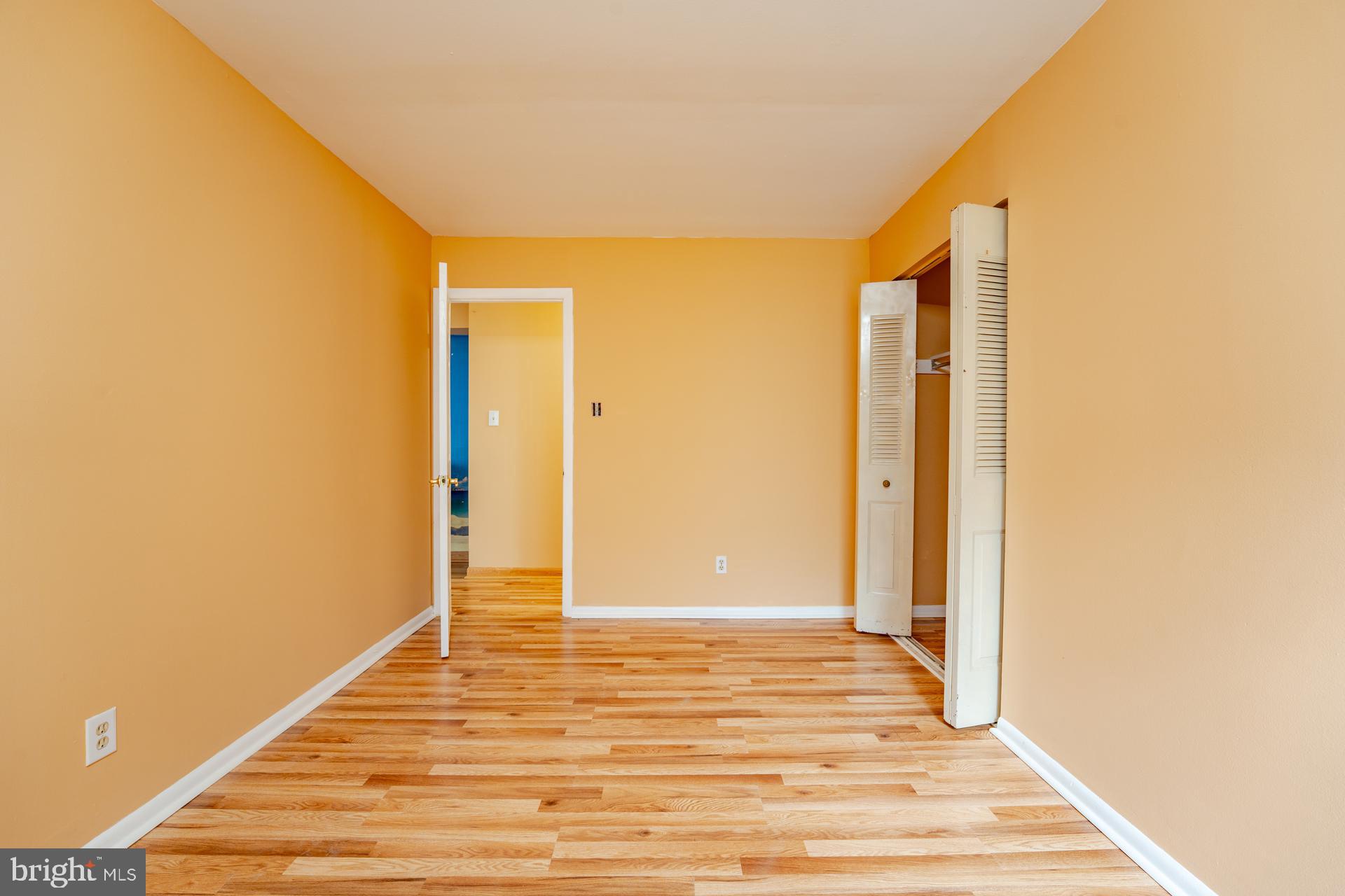 254 Vail Court, Unit 1504 Mays Landing, NJ 08330 - Photo 14 of 22 a view of a room with wooden floor