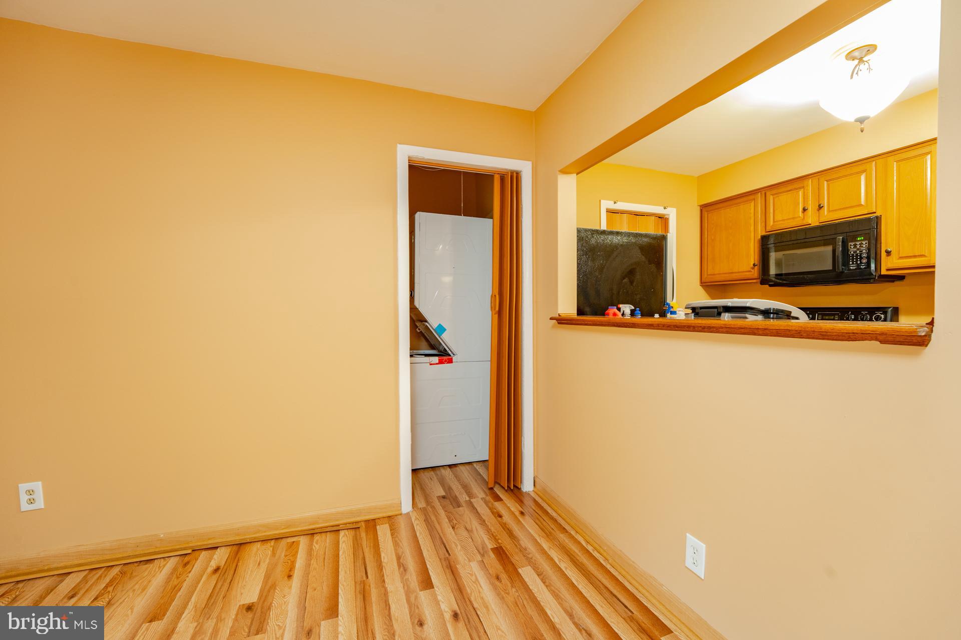 254 Vail Court, Unit 1504 Mays Landing, NJ 08330 - Photo 10 of 22 a view of a living room with a flat screen tv