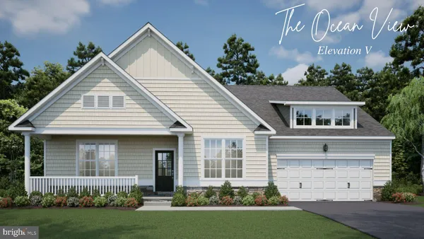 front view of a house and a yard