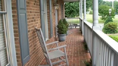 161 Highfield Road Rocky Mount, VA 24151 - Photo 4 of 8 a balcony with wooden floor and outdoor seating