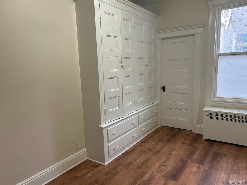 88-23 85th Street, Unit 2R Queens, NY 11421 - Photo 9 of 14 a view of walk in closet with empty racks