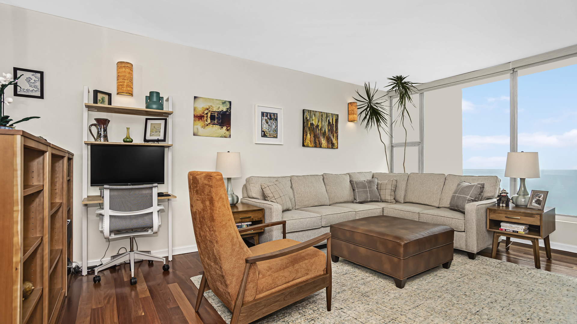 Undisclosed Address Chicago, IL 60657 - Photo 3 of 23 a living room with furniture and a flat screen tv