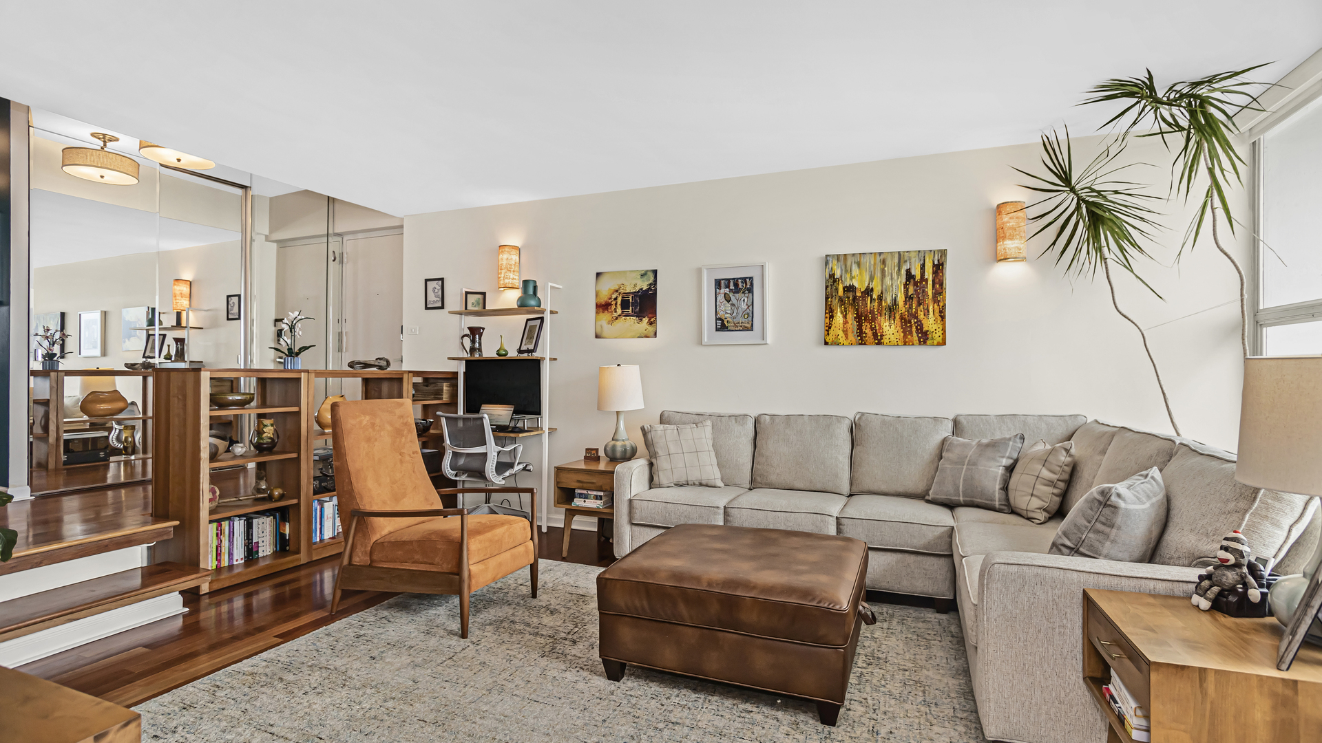 Undisclosed Address Chicago, IL 60657 - Photo 4 of 23 a living room with furniture and a potted plant