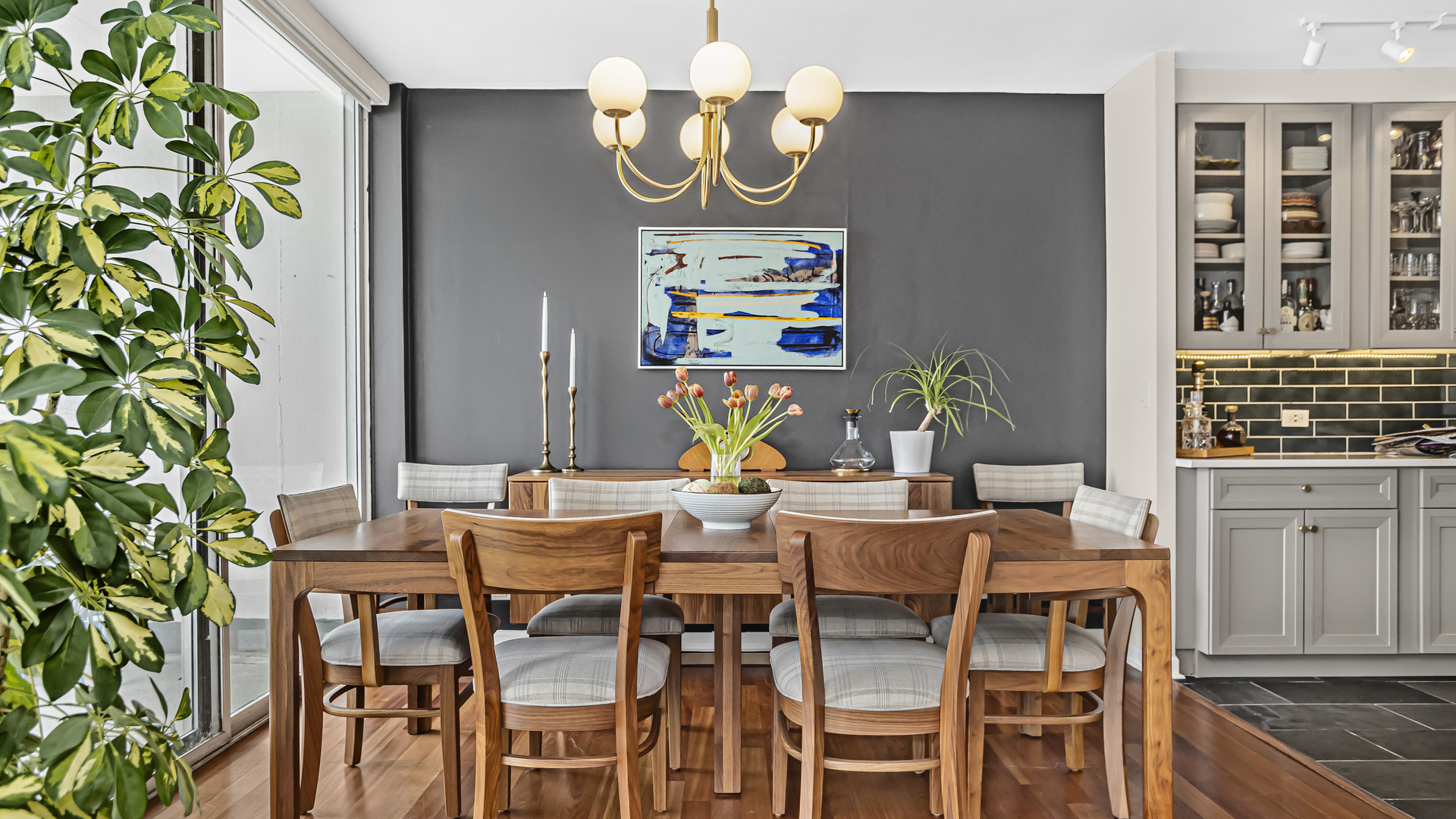 Undisclosed Address Chicago, IL 60657 - Photo 5 of 23 a view of a dining room with furniture and chandelier