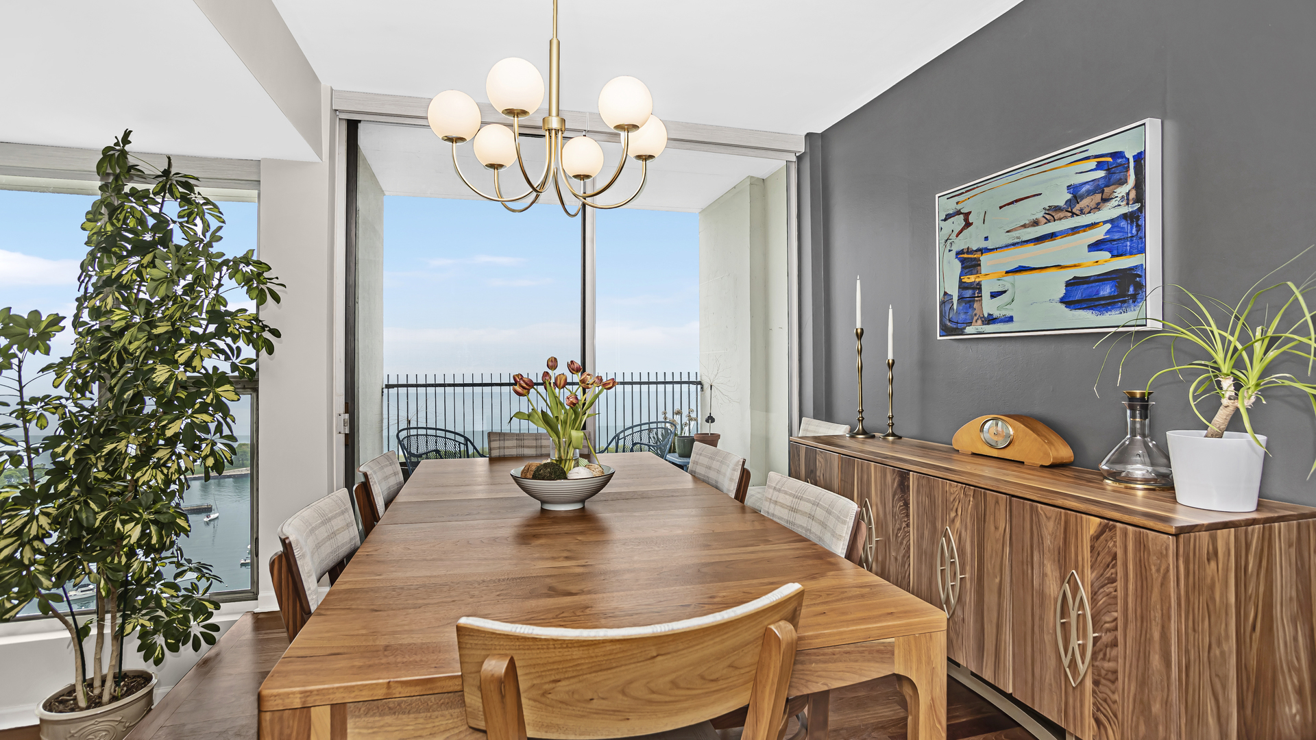 Undisclosed Address Chicago, IL 60657 - Photo 6 of 23 a view of a dining room with furniture a chandelier and wooden floor