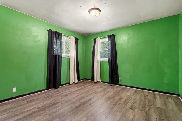 a view of a room with a large window