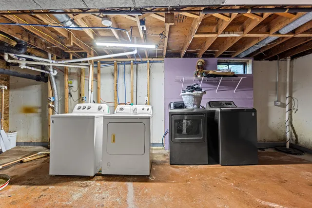 a view of a kitchen with wooden floor