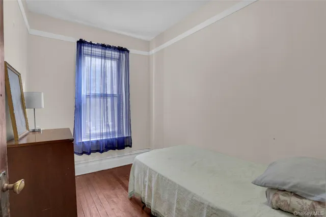 a room with a bed and a window