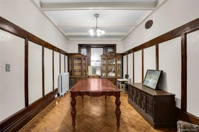 a view of living room with furniture and flat screen tv