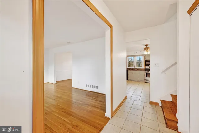 a view of a kitchen from the hallway