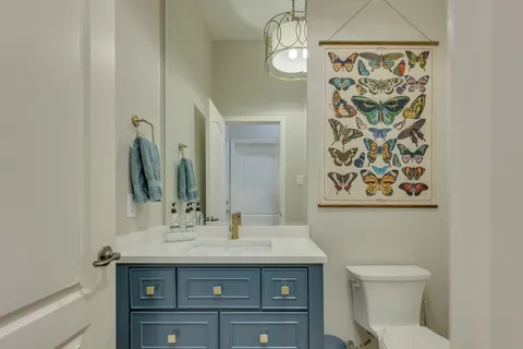 a bathroom with a sink double vanity and shower