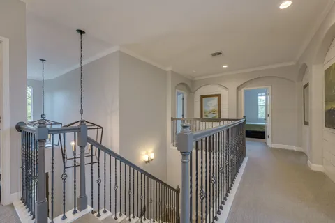 a bathroom with a double vanity sink mirror and shower
