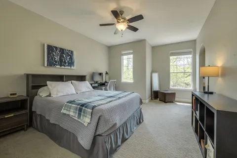 a outdoor living space with furniture and a fireplace