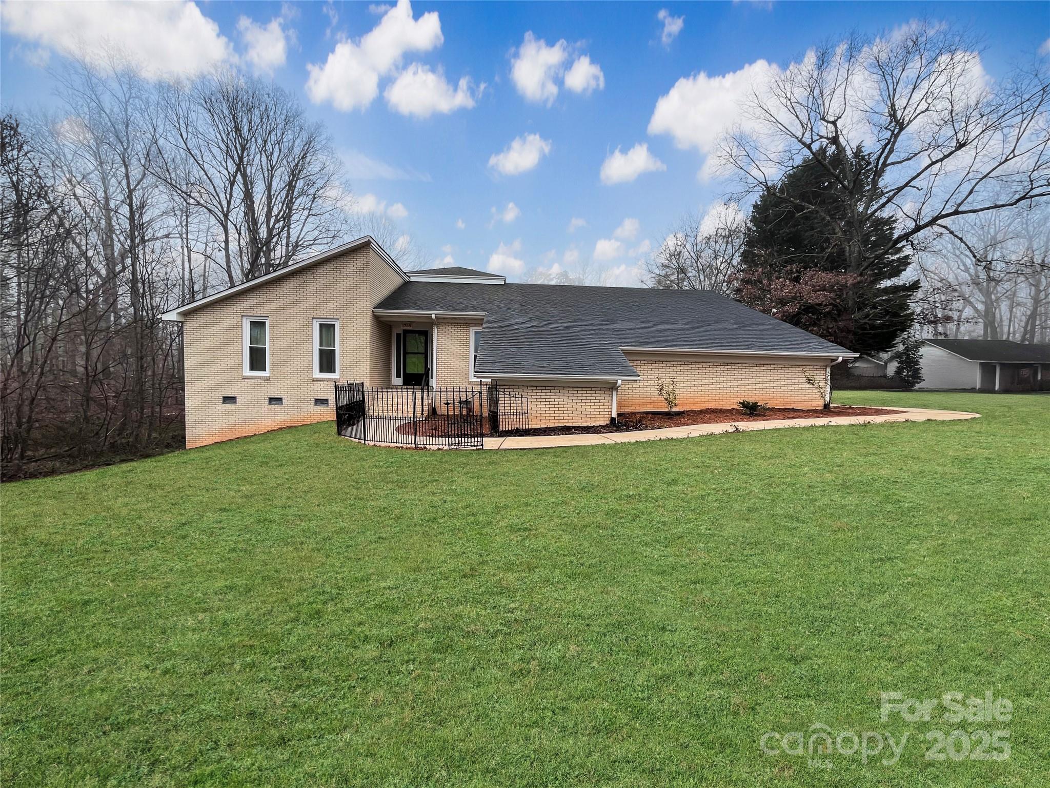 a front view of house with garden