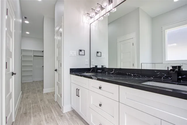 a bathroom with a bathtub and shower