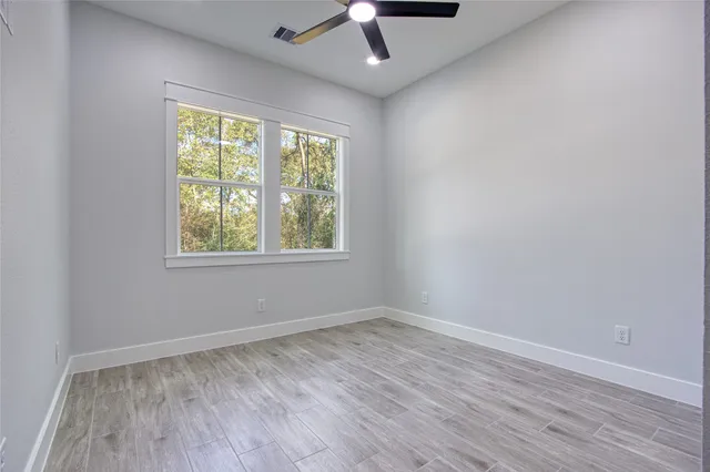 a view of a bathroom with a granite countertop sink