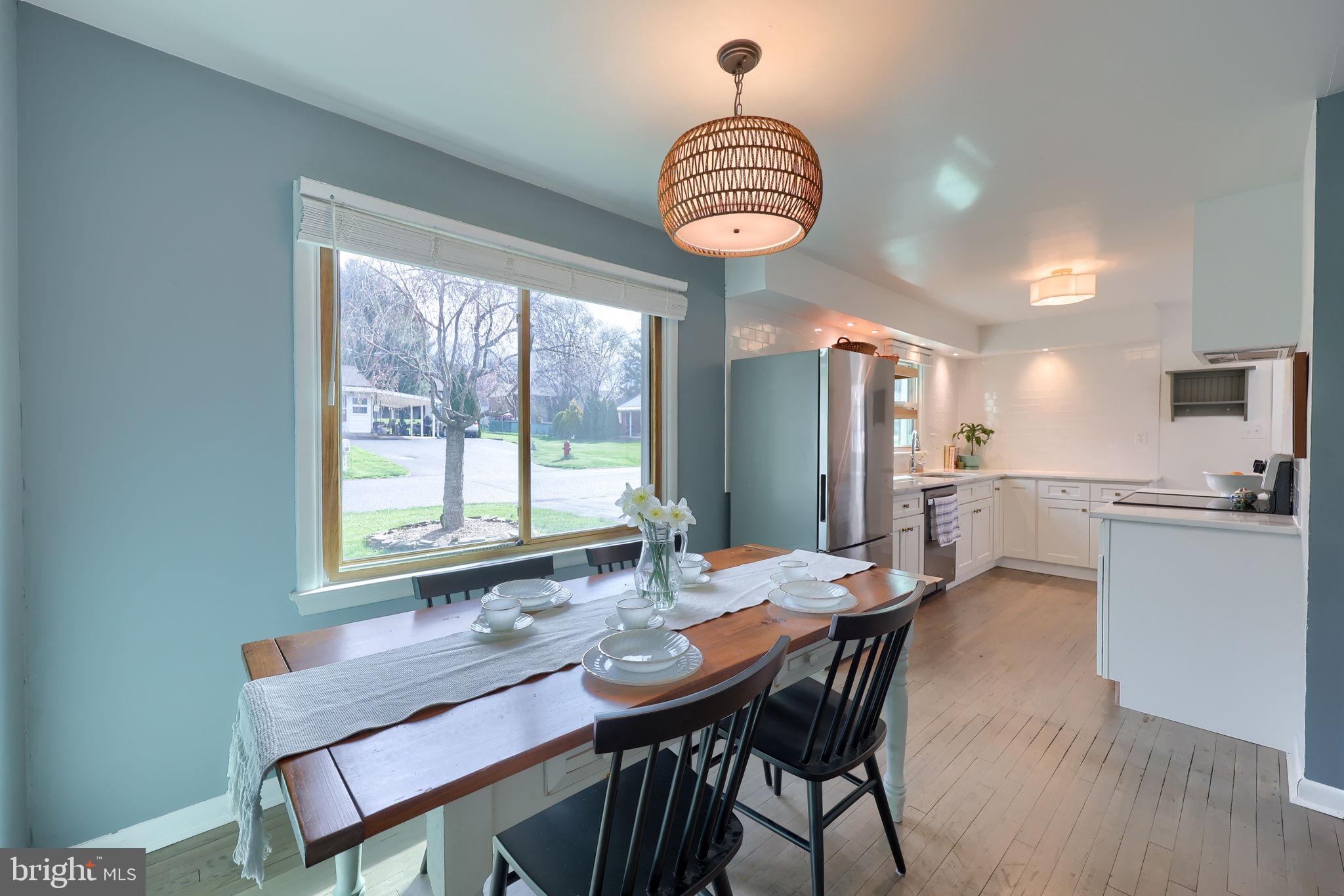 314 Dahlia Road Lancaster, PA 17602 - Photo 12 of 28 a view of a dining room with furniture window and wooden floor