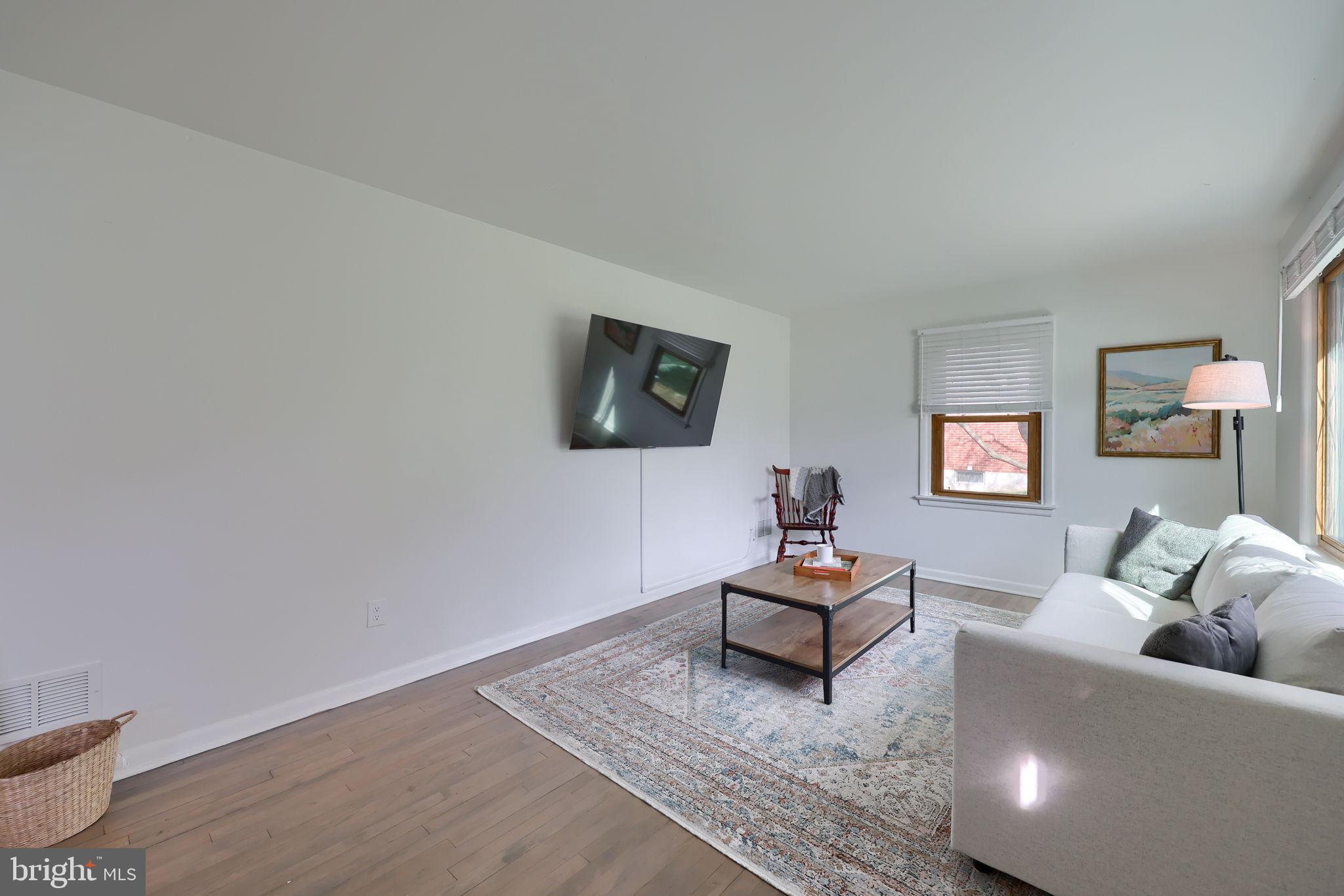 314 Dahlia Road Lancaster, PA 17602 - Photo 15 of 28 a living room with furniture and a wooden floor