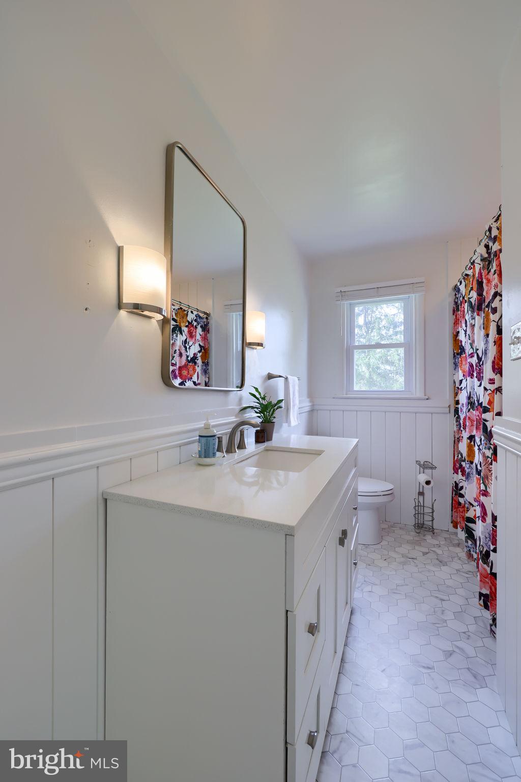 314 Dahlia Road Lancaster, PA 17602 - Photo 21 of 28 a bathroom with a sink and a mirror