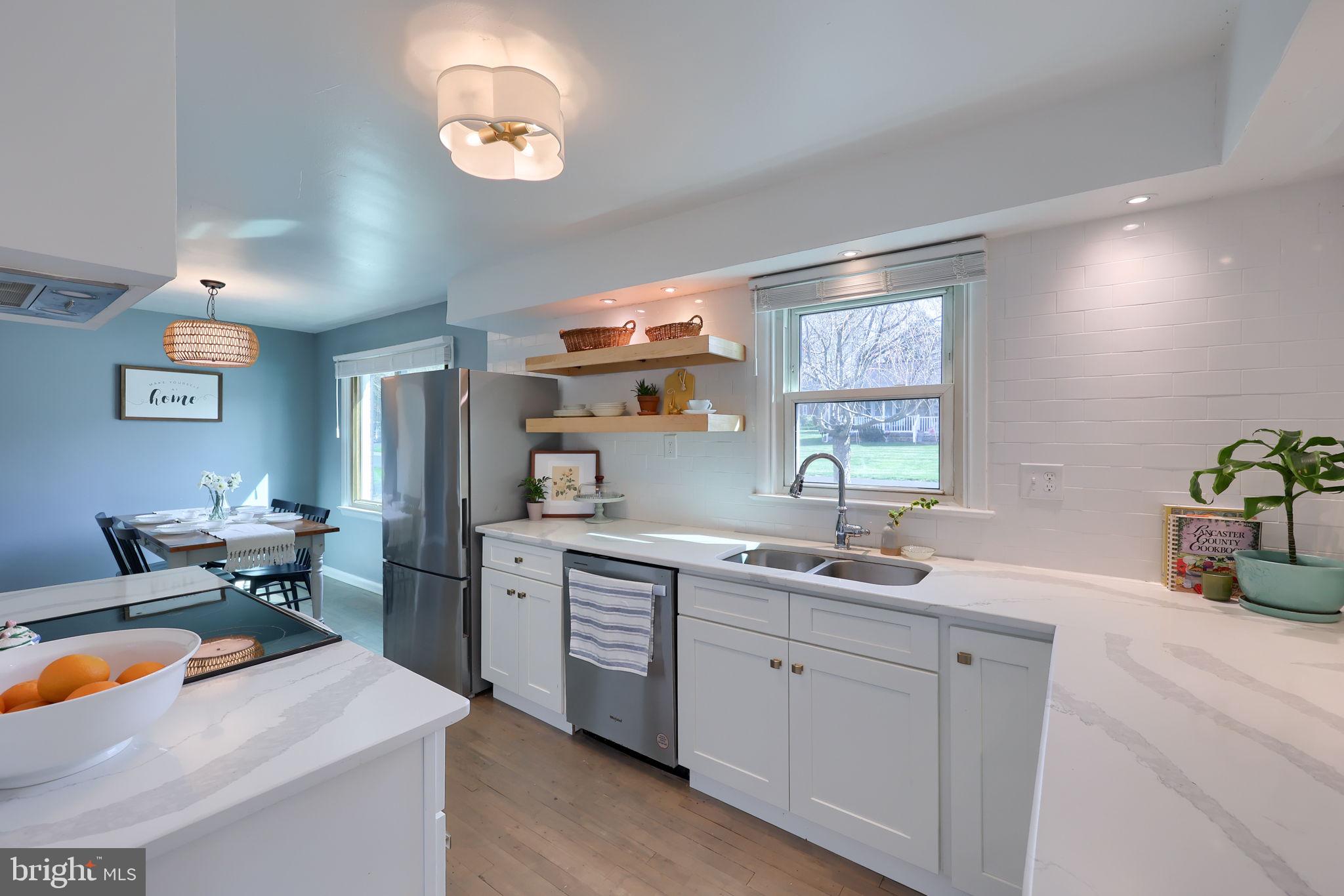 314 Dahlia Road Lancaster, PA 17602 - Photo 5 of 28 a kitchen with a sink appliances and cabinets