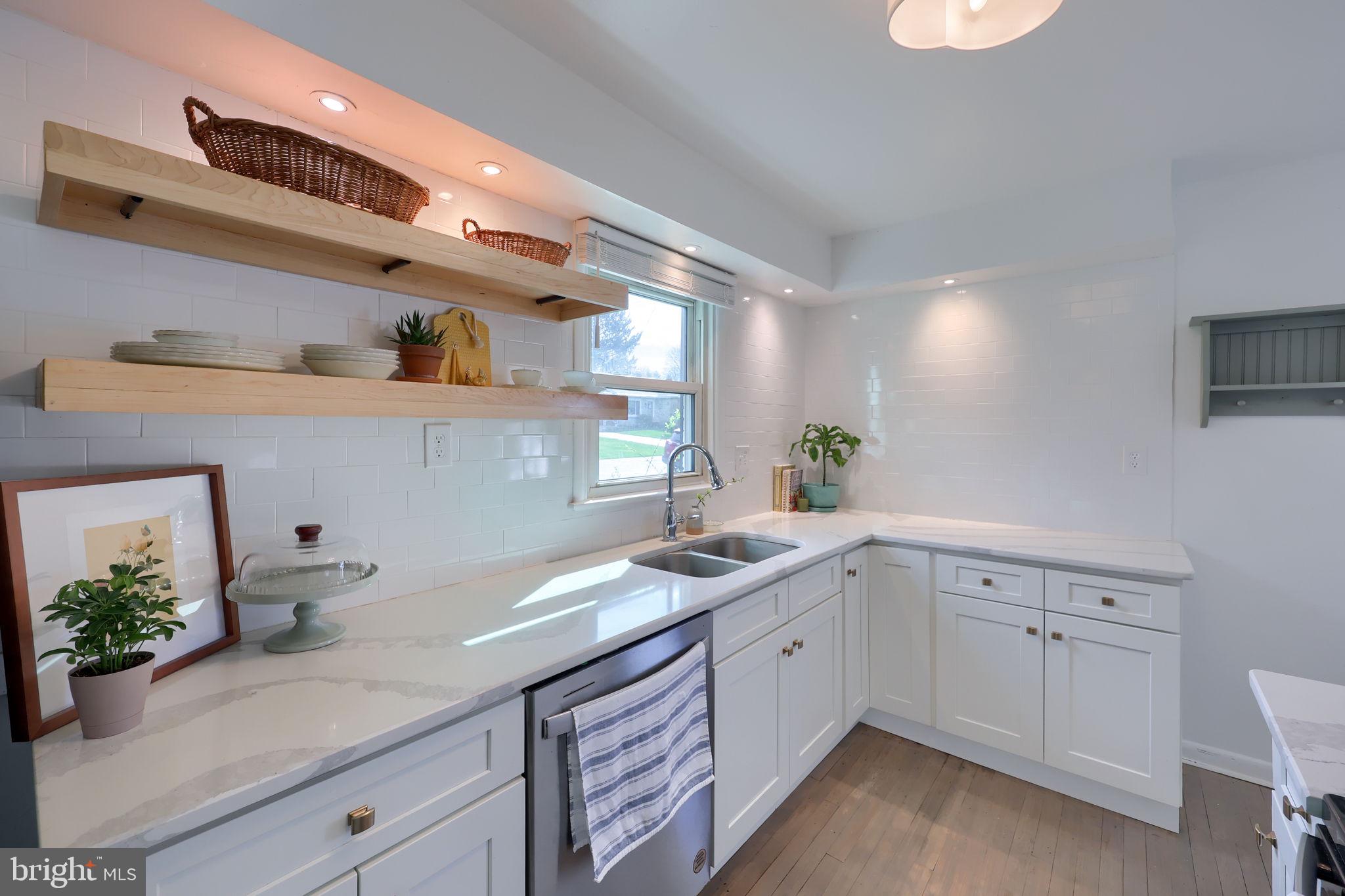 314 Dahlia Road Lancaster, PA 17602 - Photo 8 of 28 a kitchen with a sink and cabinets