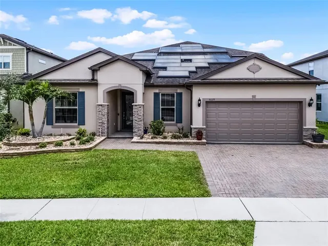 a view of a house with sitting area and furniture