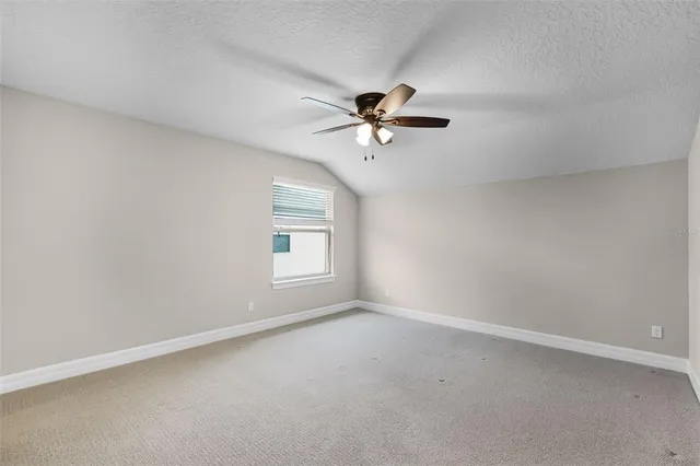 a view of a livingroom with a ceiling fan
