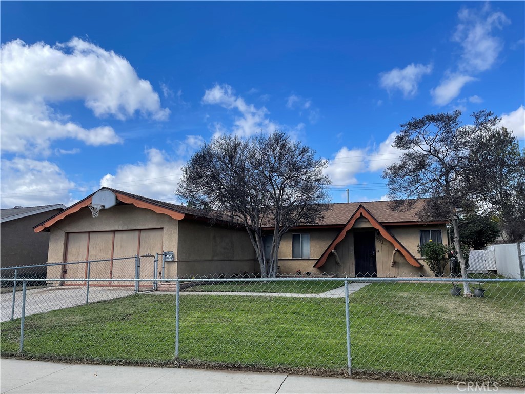 9063 Hope Avenue Riverside, CA 92503 - Photo 1 of 1 a front view of a house with a yard
