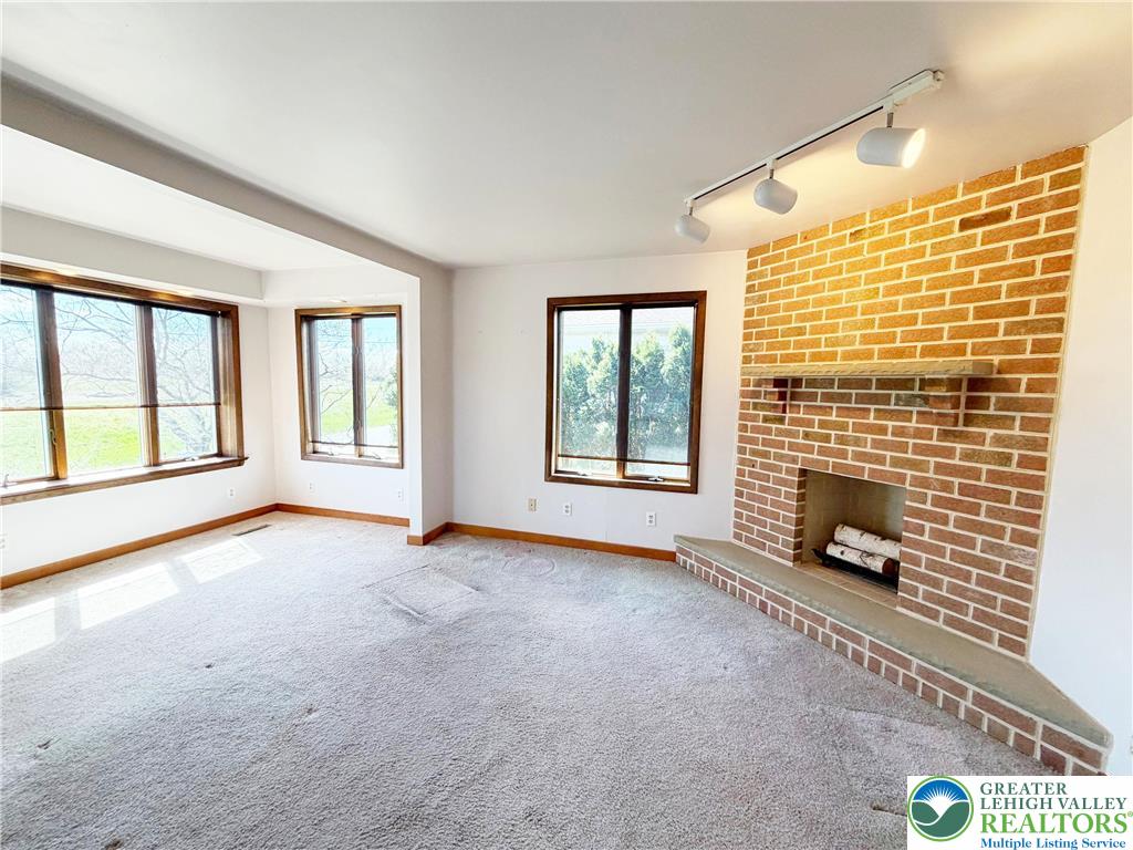 2741 Limestone Street Coplay, PA 18037 - Photo 5 of 35 a view of an empty room with glass door
