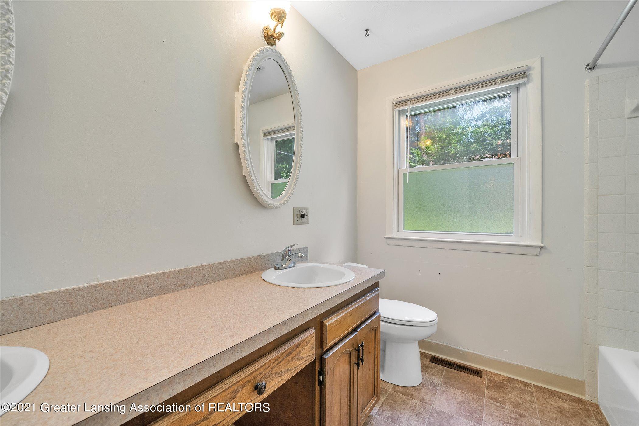 12159 Pine Ridge Drive Perry, MI 48872 - Photo 24 of 40 24-12159-Pine-Ridge-Dr-WindowStill-Real-