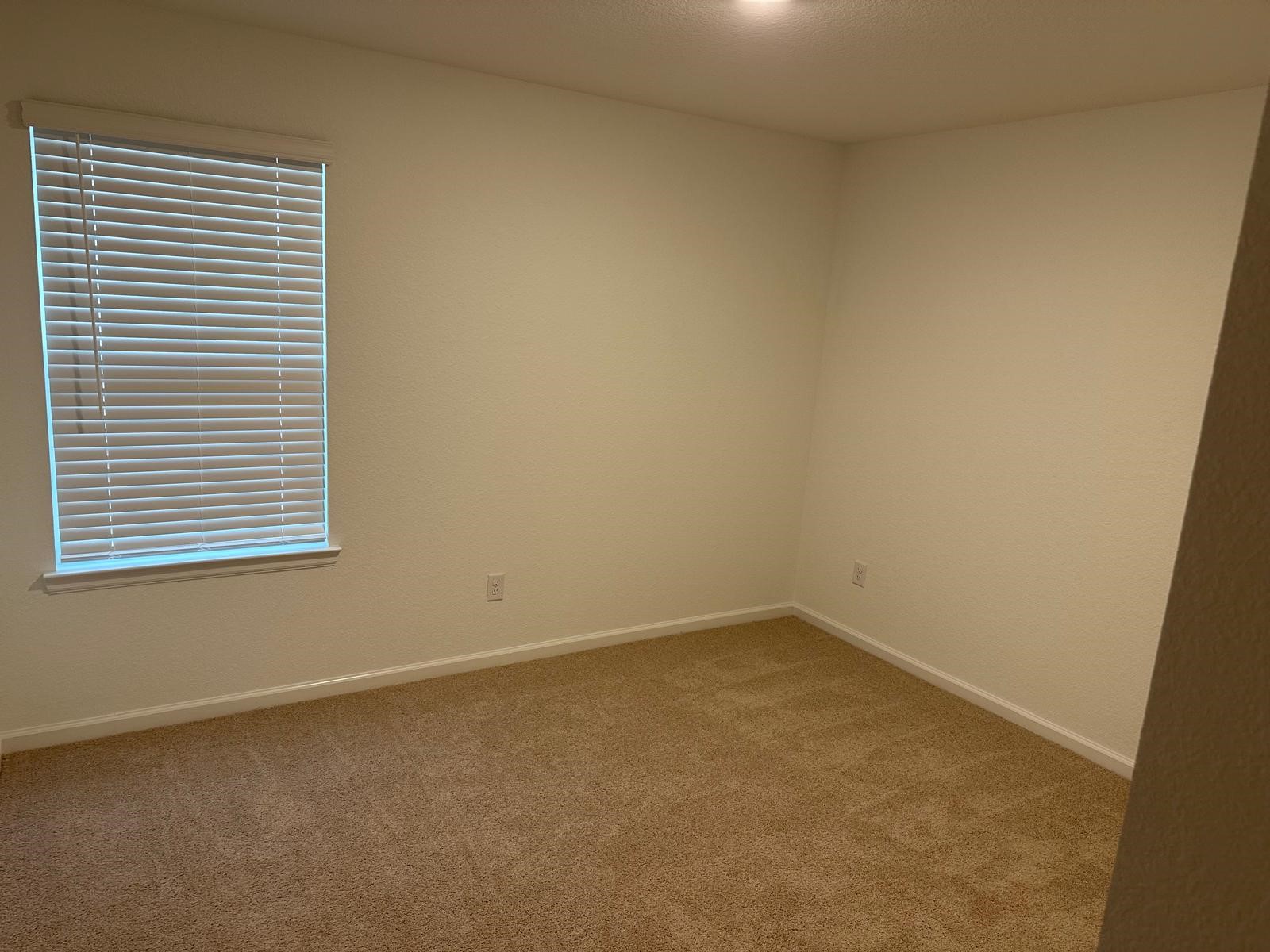 901 Coffee Ml Lane College Station, TX 77845 - Photo 11 of 18 an empty room with a window