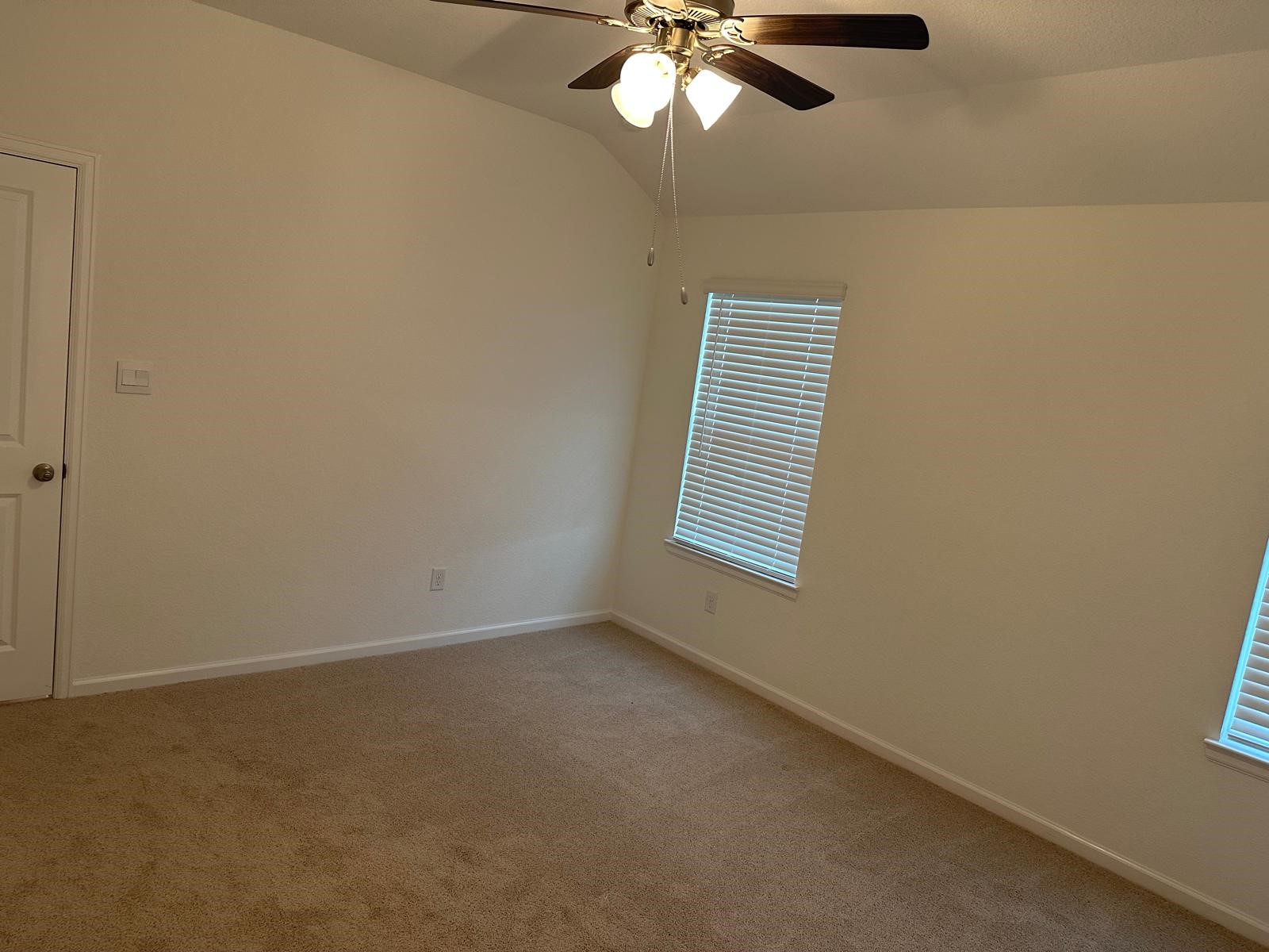901 Coffee Ml Lane College Station, TX 77845 - Photo 12 of 18 an empty room with a window
