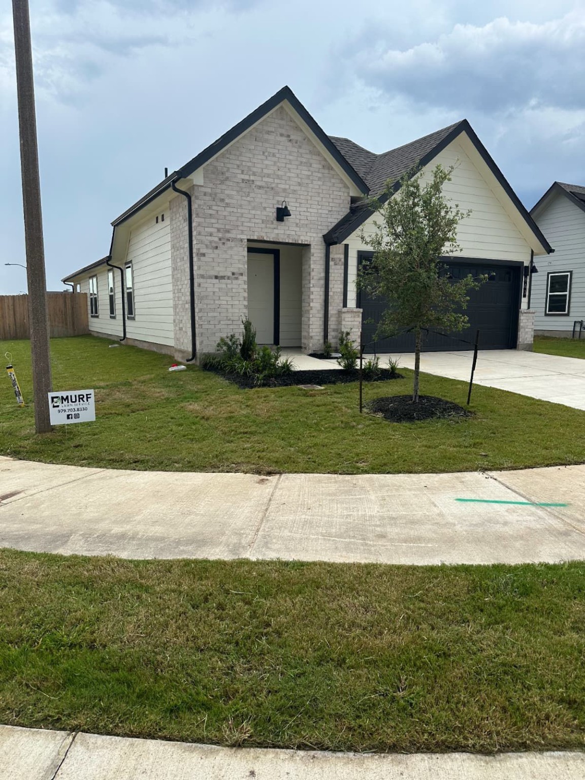 901 Coffee Ml Lane College Station, TX 77845 - Photo 2 of 18 a view of a house with a yard and fence