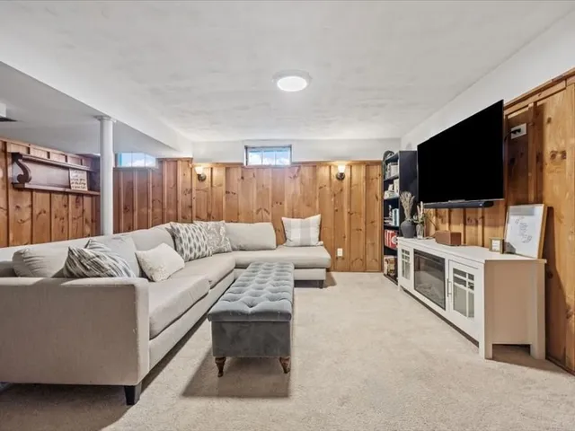 a living room with furniture and a couch