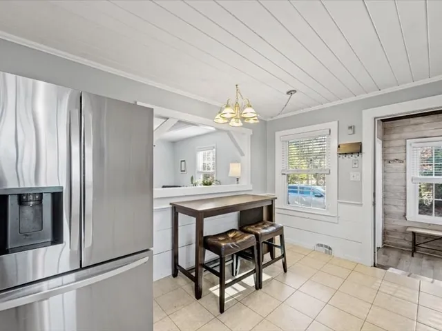 a view of a livingroom with furniture and window
