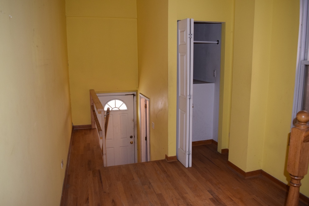 4519 North Western Avenue Chicago, IL 60625 - Photo 10 of 25 a view of a hallway with wooden floor
