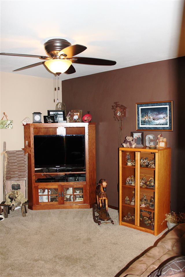 6056 North Knoll Road Monroe Center, IL 61052 - Photo 8 of 24 a view of a livingroom with furniture