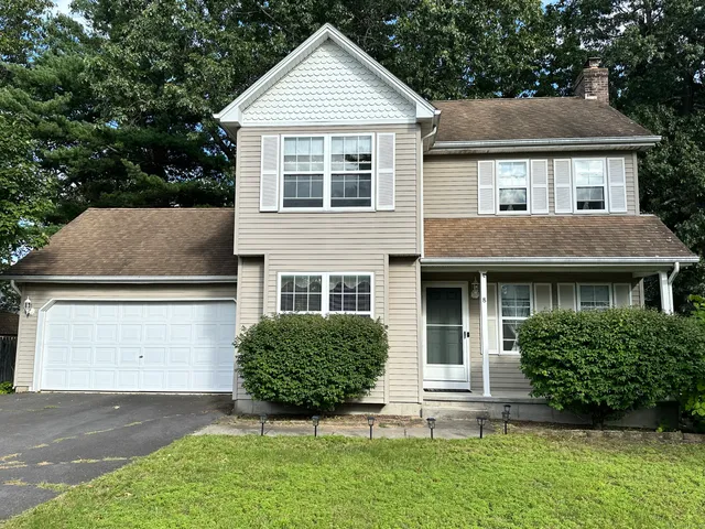 a view of outdoor space yard and front view of a house