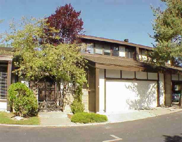 3905 Sarah Court Reno, NV 89509 - Photo 1 of 1 a front view of a house with garden