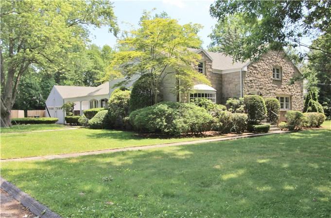 215 Pepper Ridge Road Stamford, CT 06905 - Photo 1 of 1 a view of a house with a garden and yard