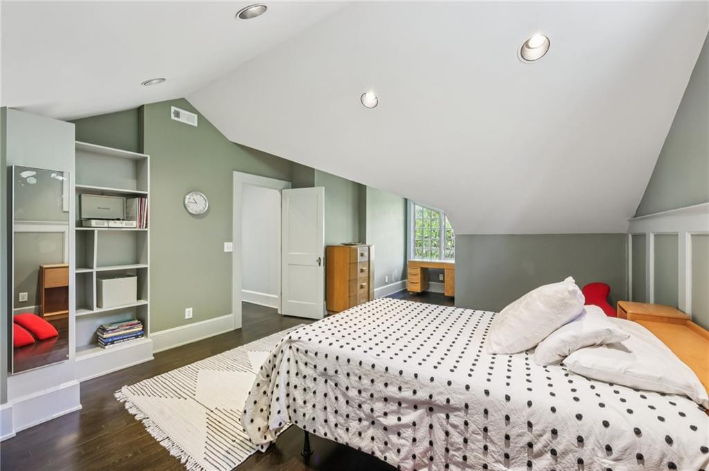 429 Adams Street Decatur, GA 30030 - Photo 39 of 100 a bedroom with a bed and a cabinets