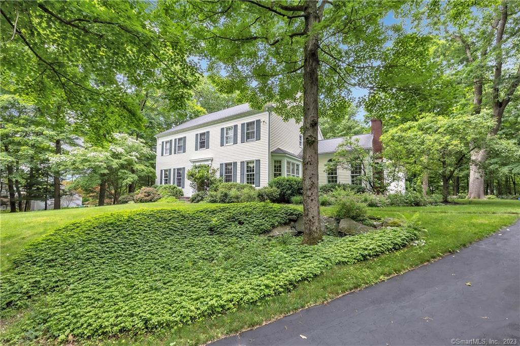 26 Grandview Drive Ridgefield, CT 06877 - Photo 1 of 1 a front view of a house with a yard
