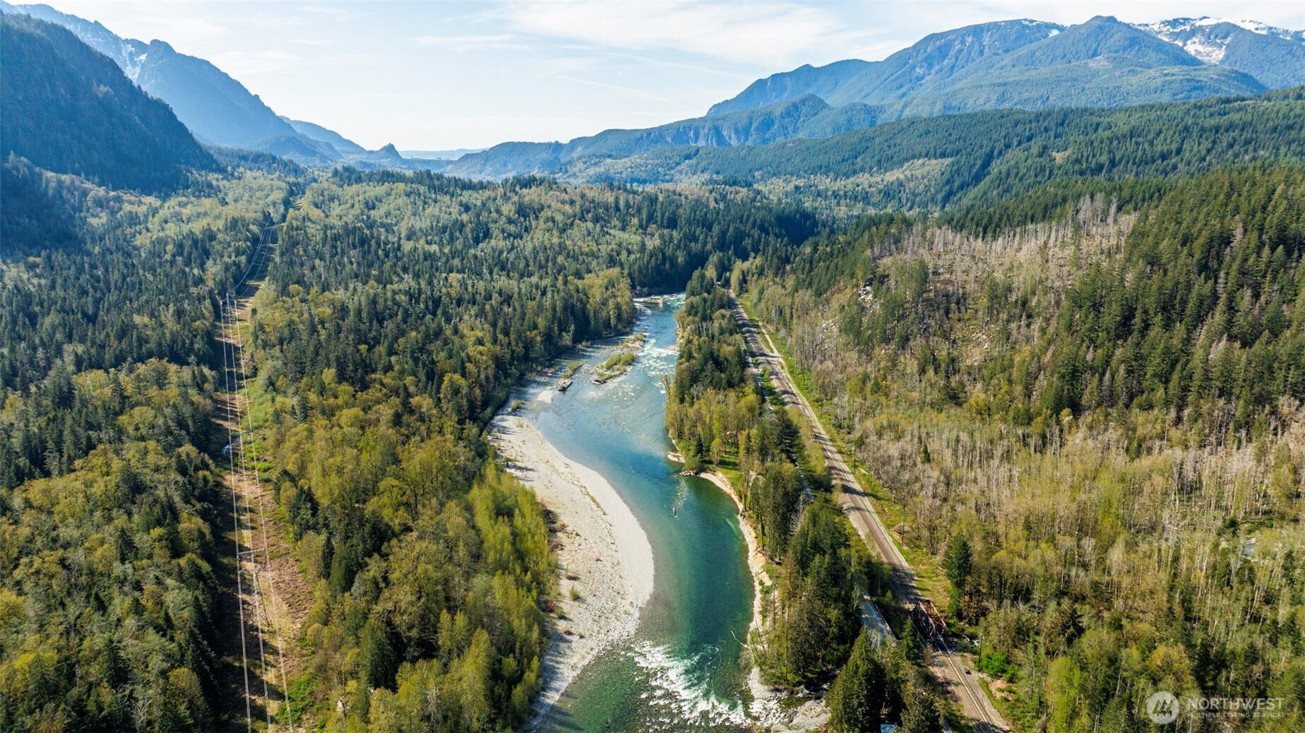 0 State Route 2 Gold Bar, WA 98251 - Photo 13 of 25 a view of a lake with mountains in the background